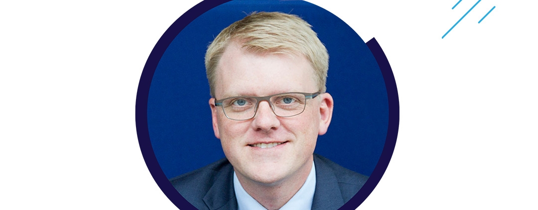 Headshot of LGN Partner David Asp with text reading “LGN Partner Reappointed – Reappointed Chair, Minnesota Campaign Finance & Public Disclosure Board.”