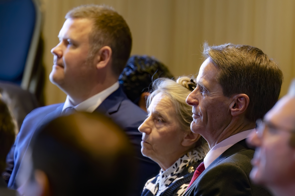 LGN colleagues smiling as Joseph Bruckner is announced as the award recipient.